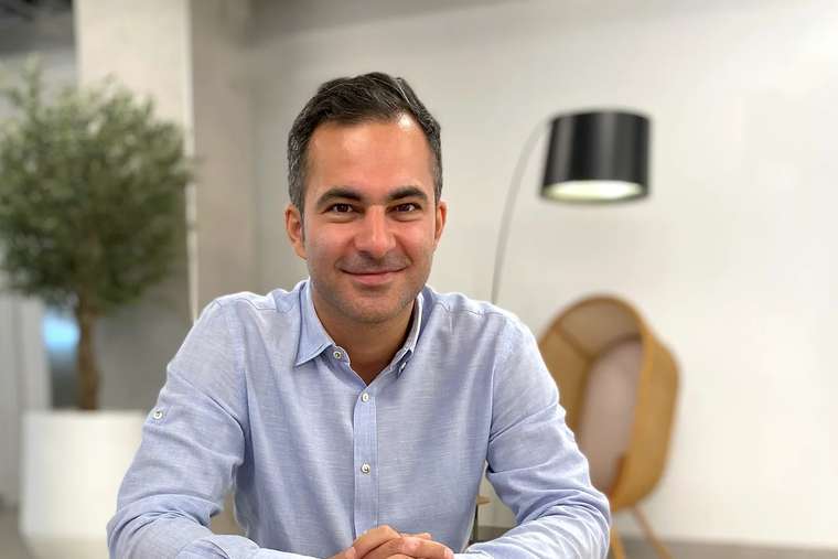 Hamed Farhadian at a meeting table